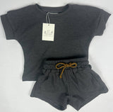 A charcoal gray waffle outfit set with a top and shorts, featuring a brown rope drawstring against a white background.