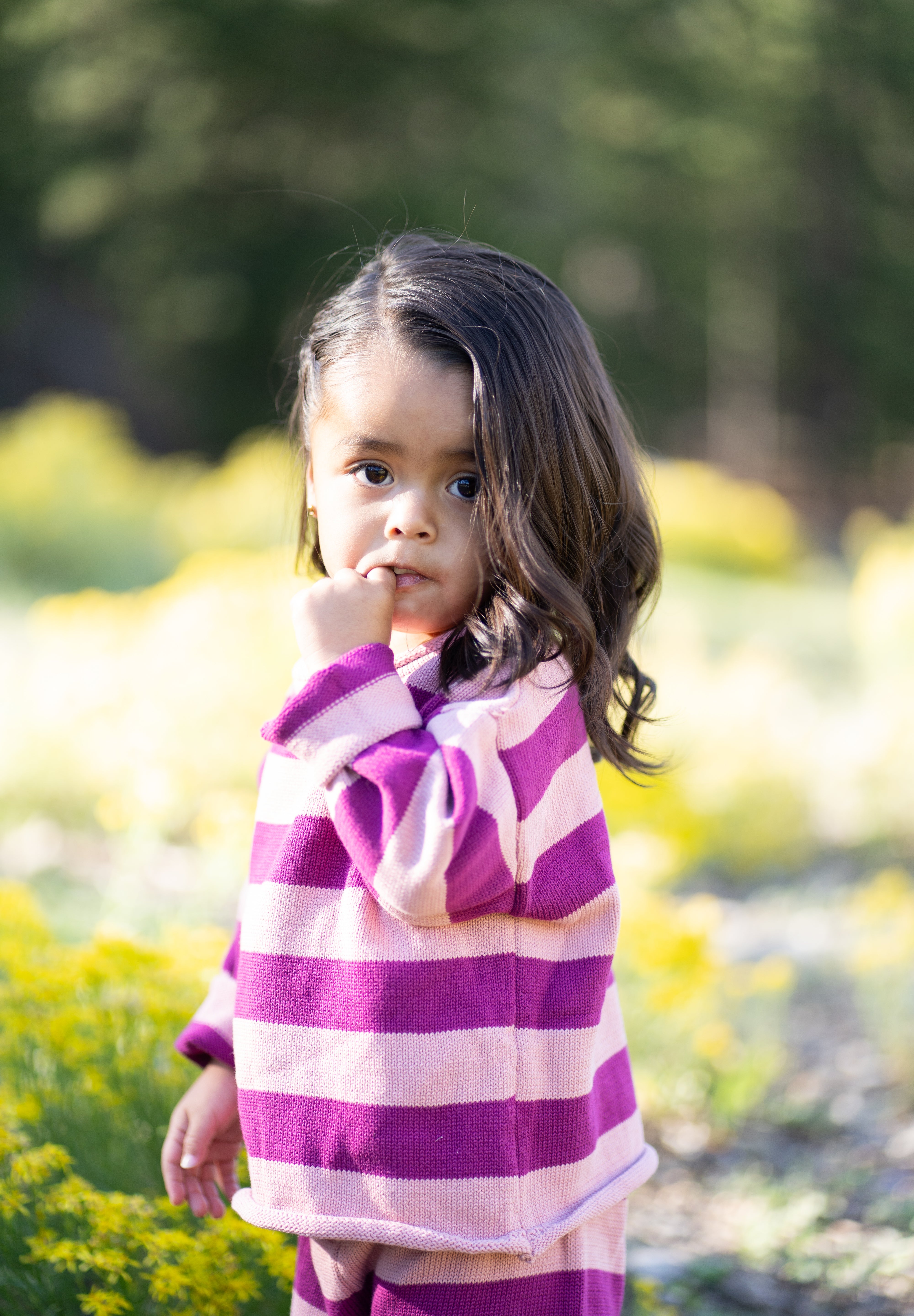 a girl in a striped shirt
