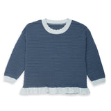 a blue and white sweater