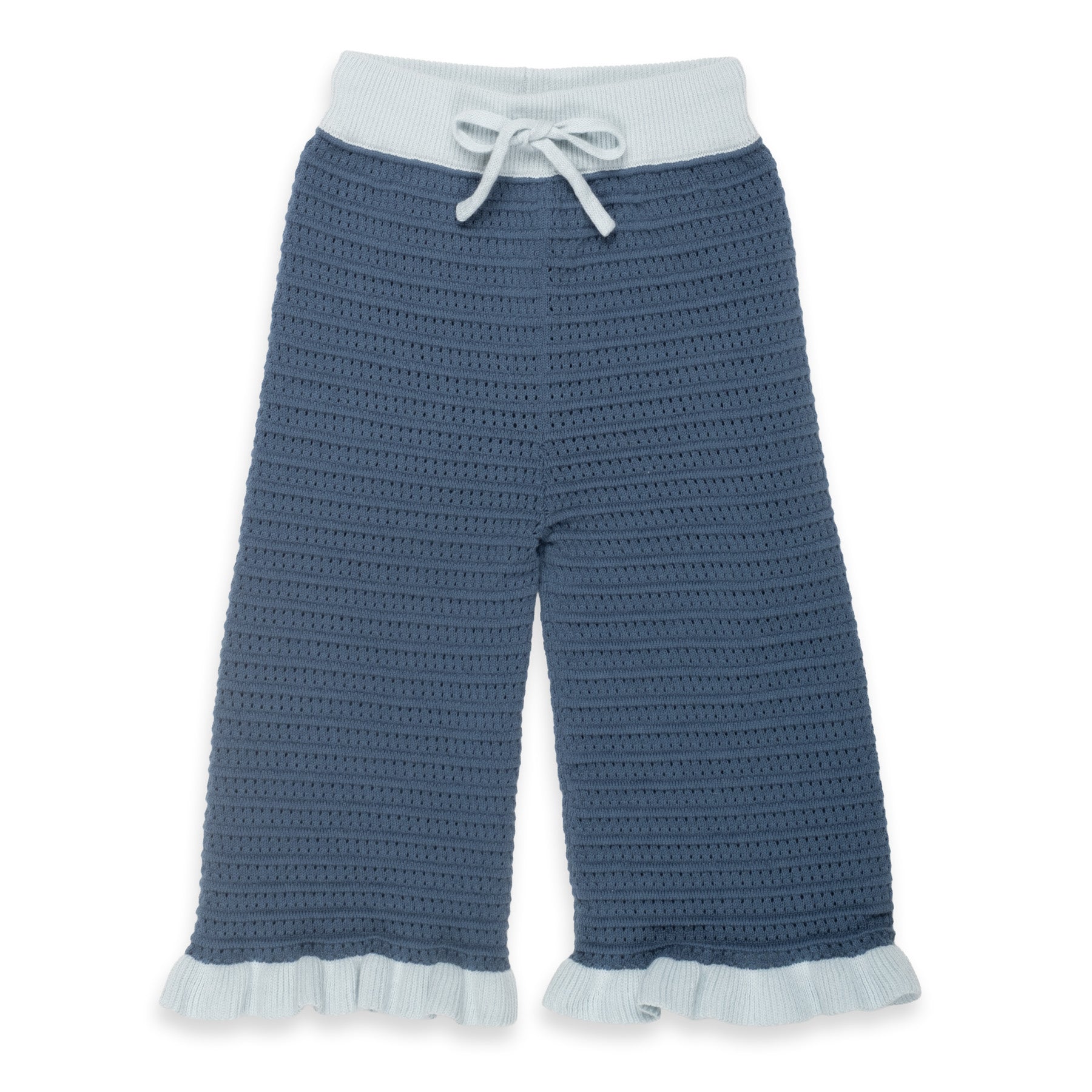 a pair of pants with ruffles