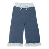 a pair of pants with ruffles
