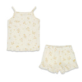 Set of cream-colored top and shorts with brown floral pattern on a white background.