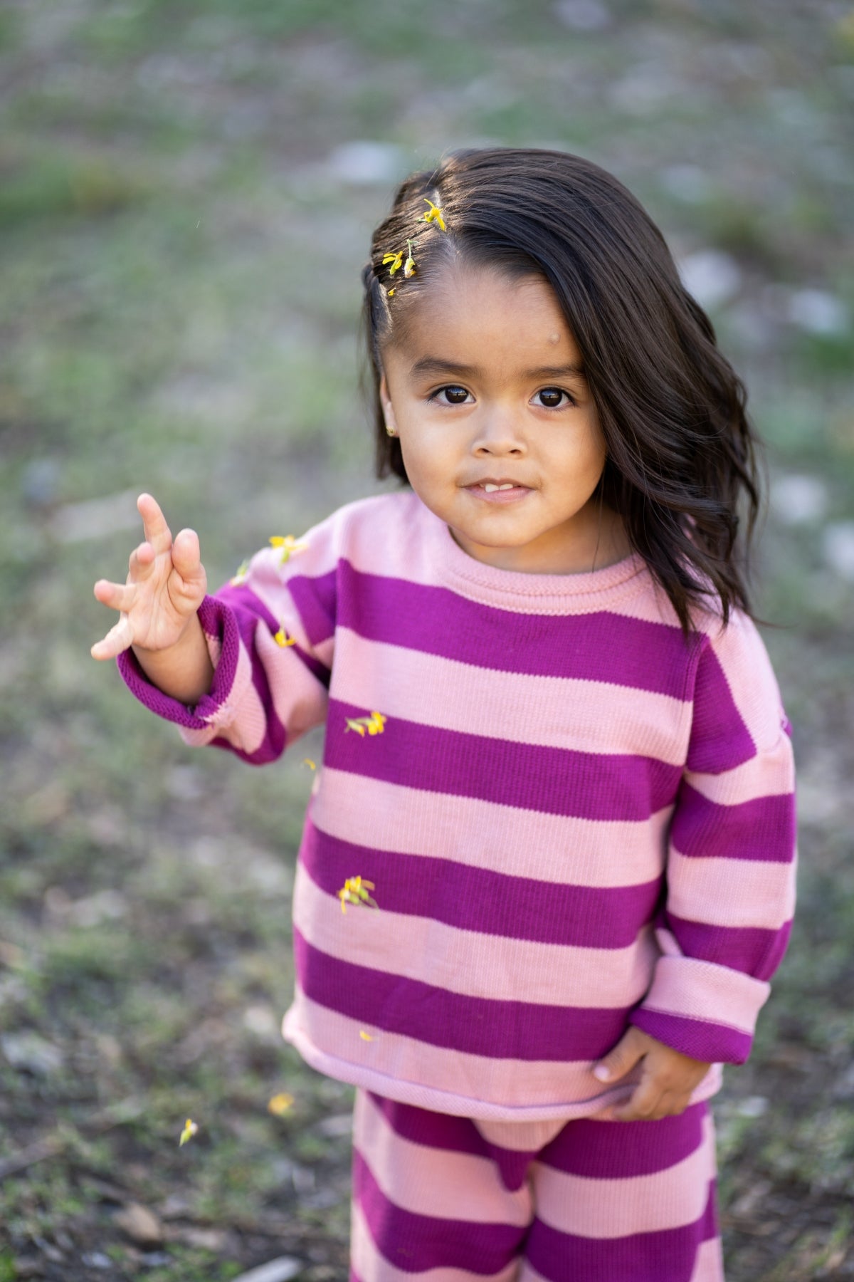 a girl in a striped shirt