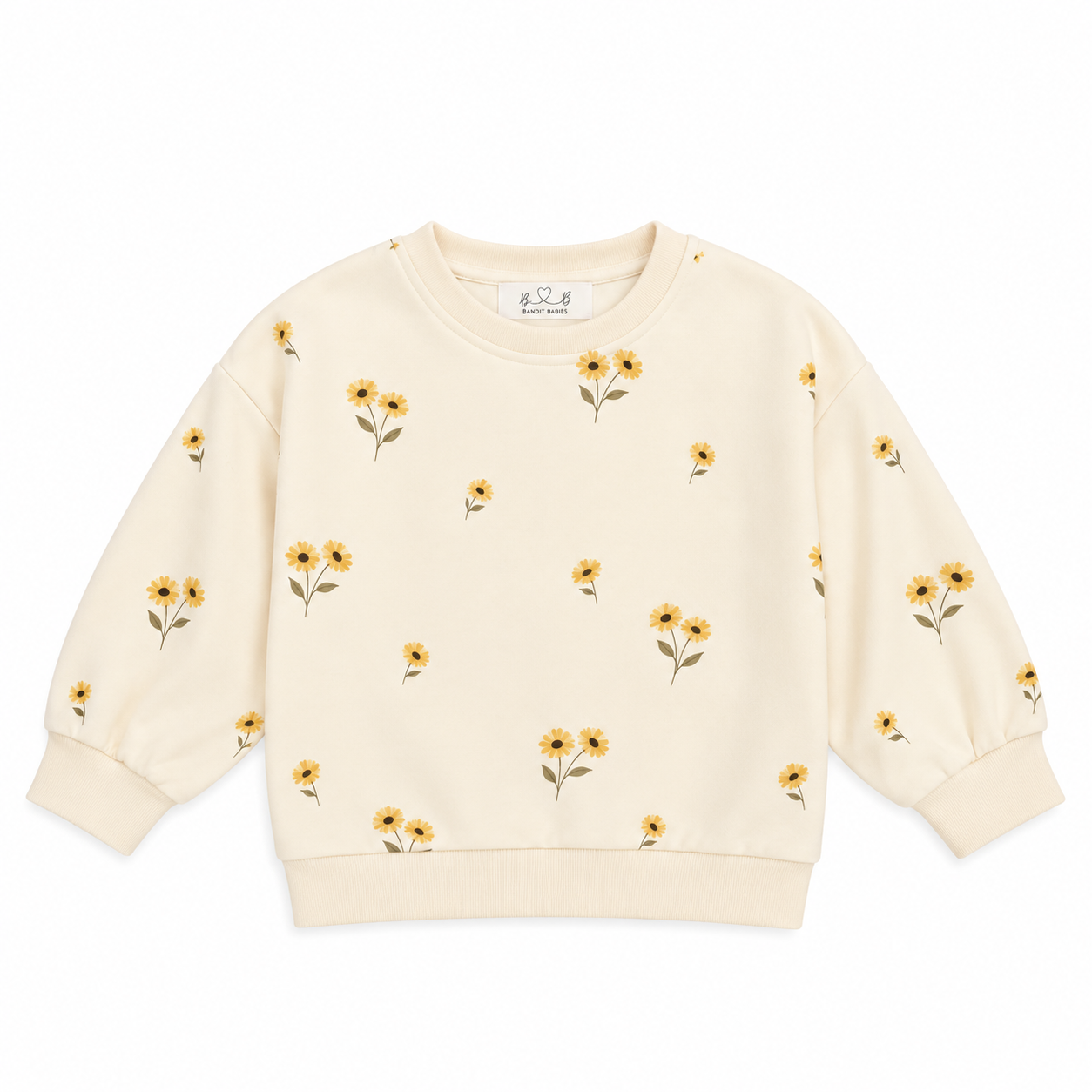 a white sweater with yellow flowers on it