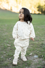 a child standing in grass